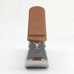 Front view of a designer genuine leather stainless steel exercise bench